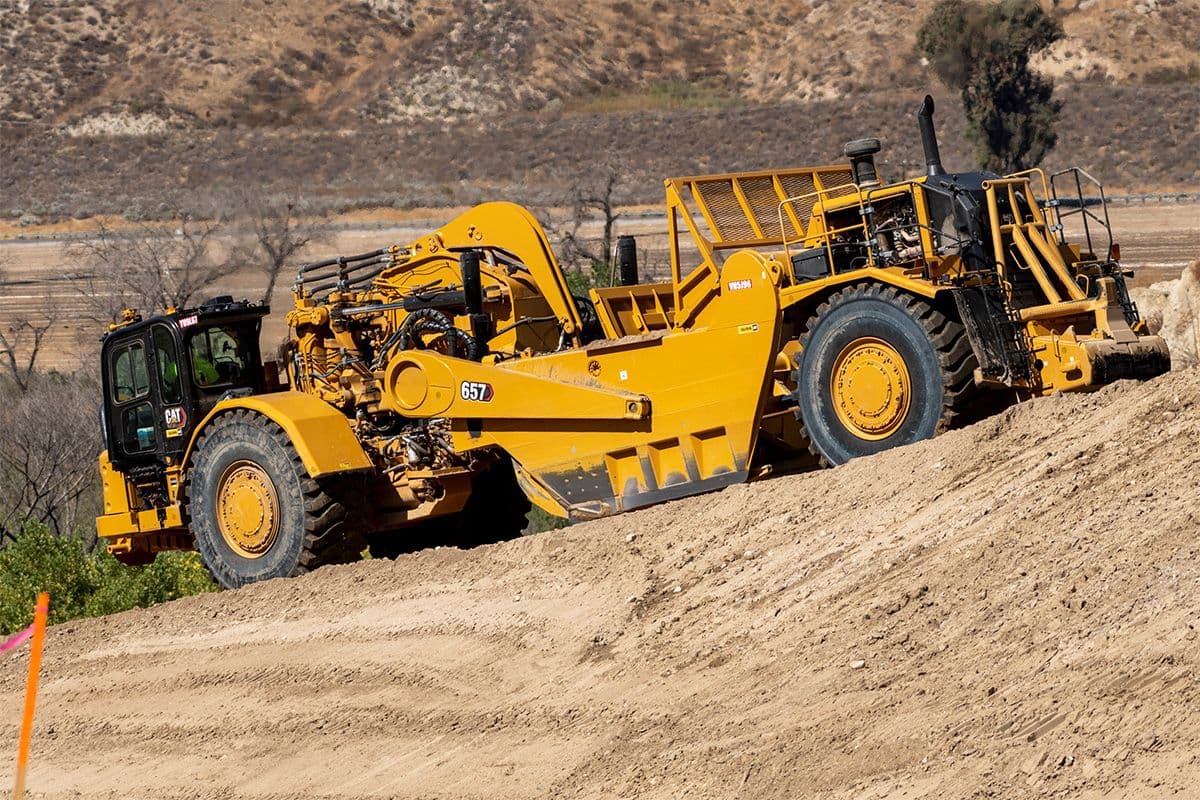 Cat Grade avec Aide séquentielle pour Décapeuses automotrices